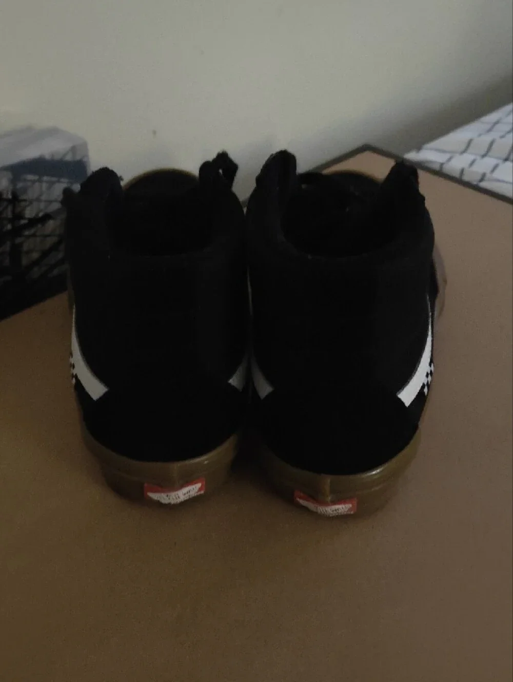 Vans Black High-Top Sneakers with White Side Stripe and Gum Sole